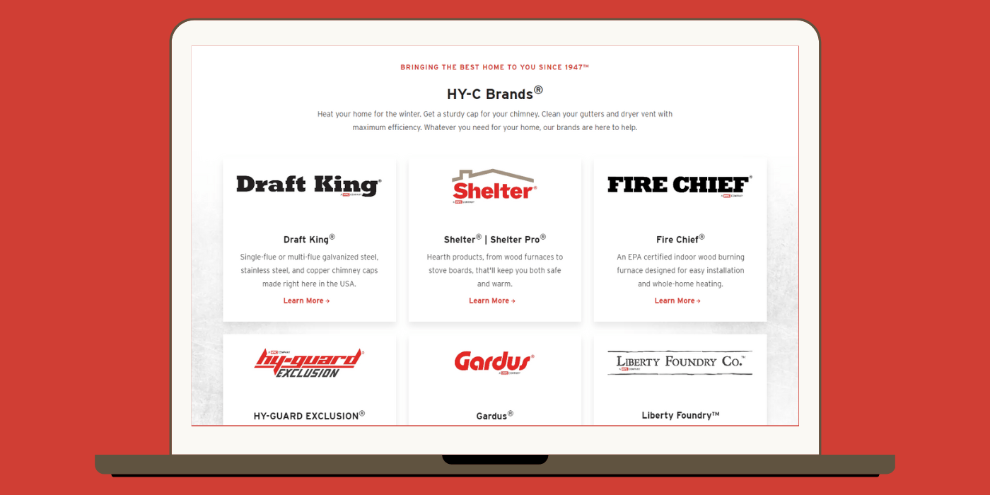 A laptop computer against a red background. Its screen show the brand page of the HY-C website.