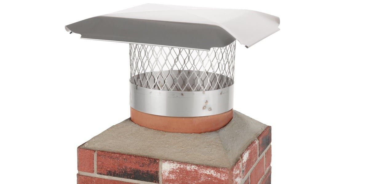 A HY-C slip-in chimney cap installed on a chimney flue against a white background