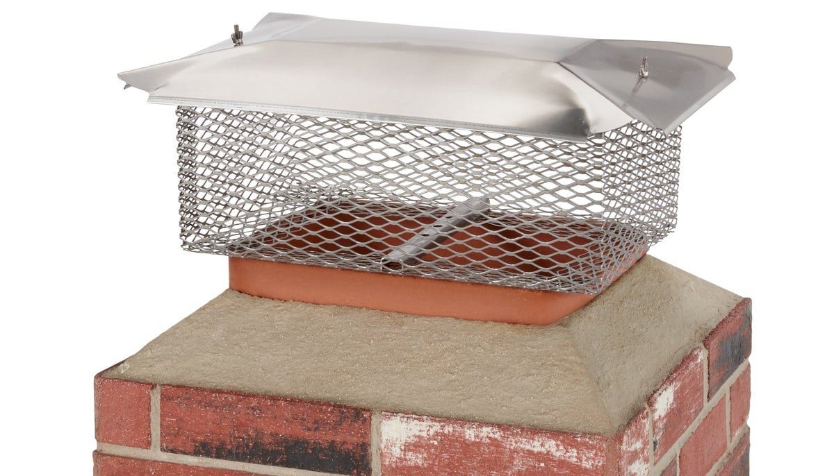 A HY-C universal chimney cap installed on a chimney flue against a white background