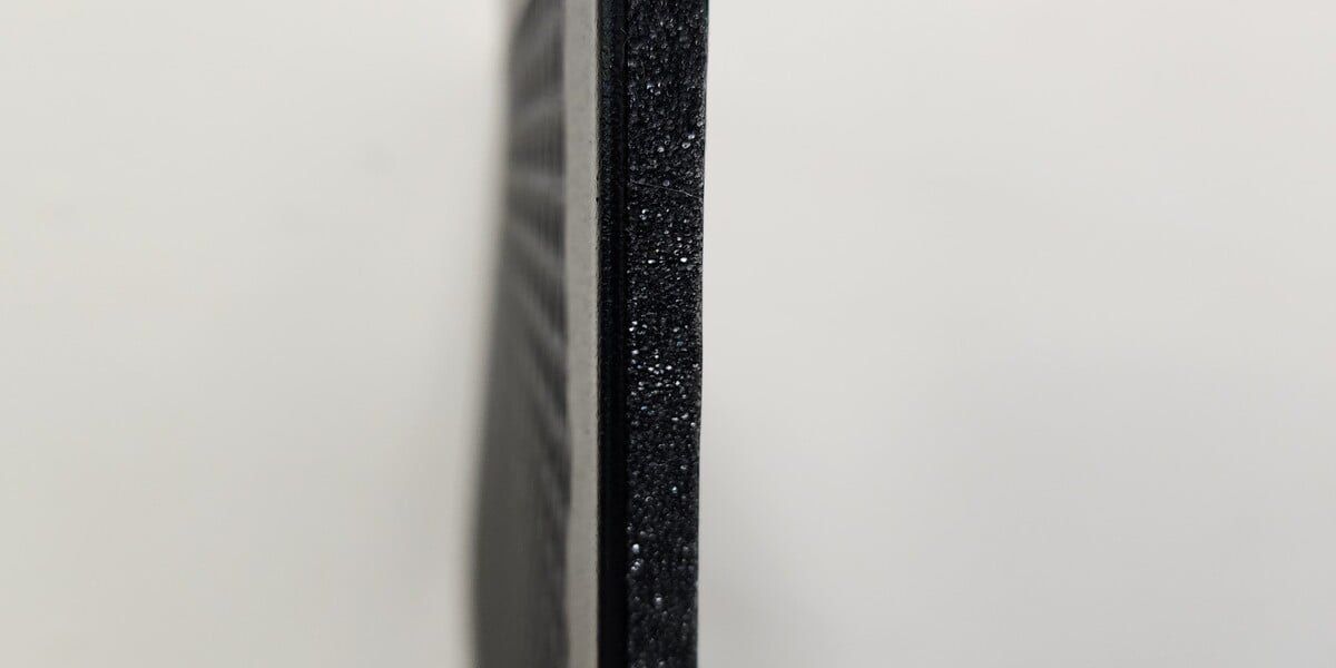 The side of a HY-GUARD EXCLUSION foundation vent screen with InsectArmor showing the foam included on the screen