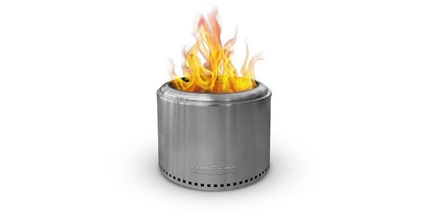 A Duraflame smokeless fire pit sitting against a white backdrop. A fire can be seen burning in the fire pit.