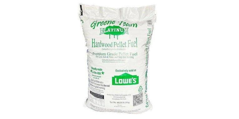 A package of Greene Team Platinum Hardwood Pellet Fuel. The package is white with green text.