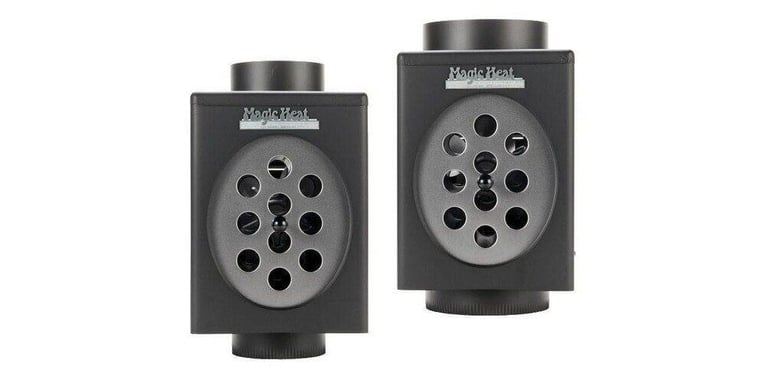 Two Magic Heat heat reclaimers side by side — one with a 6-inch connector pipe and the other with an 8-inch connector pipe.