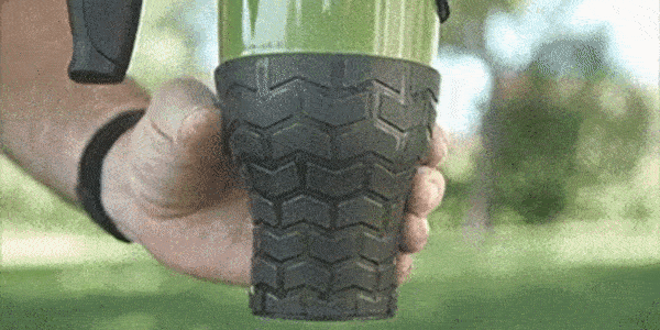 A GIF showing a man squeezing the Jell-Lock base of a Good Vibrations Rough Rider Off-Road Drinking Mug, closing its lid, and flipping it over