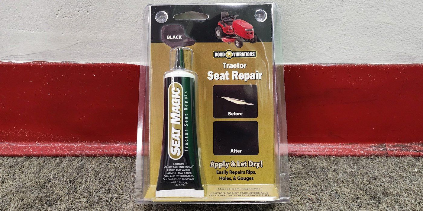 A tube of Good Vibrations Seat Magic Tractor Seat Repair in its packaging leaning against a wall