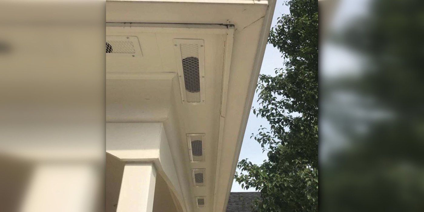 HY-GUARD EXCLUSION soffit guards installed over soffit vent openings on a home