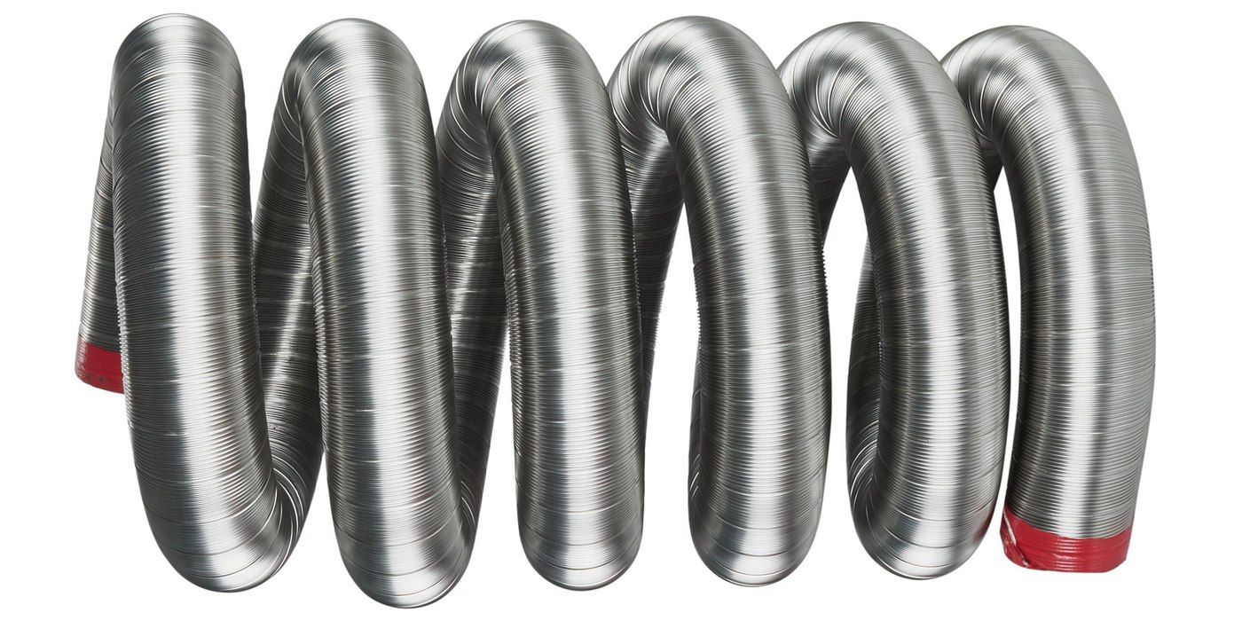 A coil of round stainless steel chimney liner against a white background
