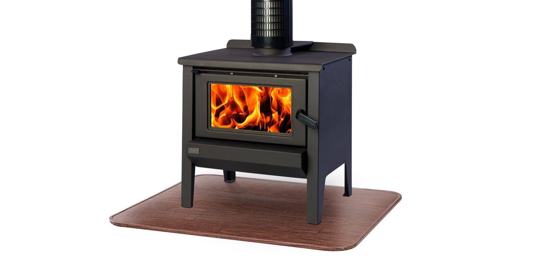 A wood stove with a roaring fire in its firebox resting on a woodgrain type 2 stove board.