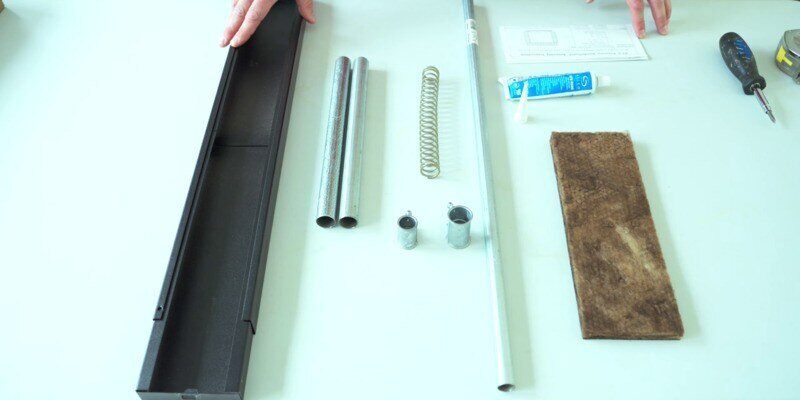 The contents of a Liberty Foundry Co. Smoke Guard kit laid out on top of white table.