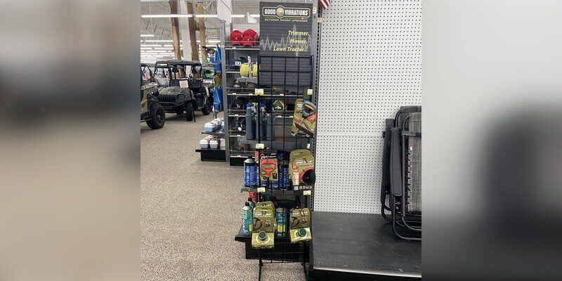 A freestanding Good Vibrations display on the floor of a hardware store.
