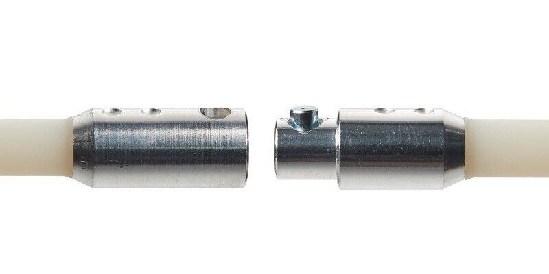 A closeup of the button-style connection of a SootEater chimney liner cleaning kit.