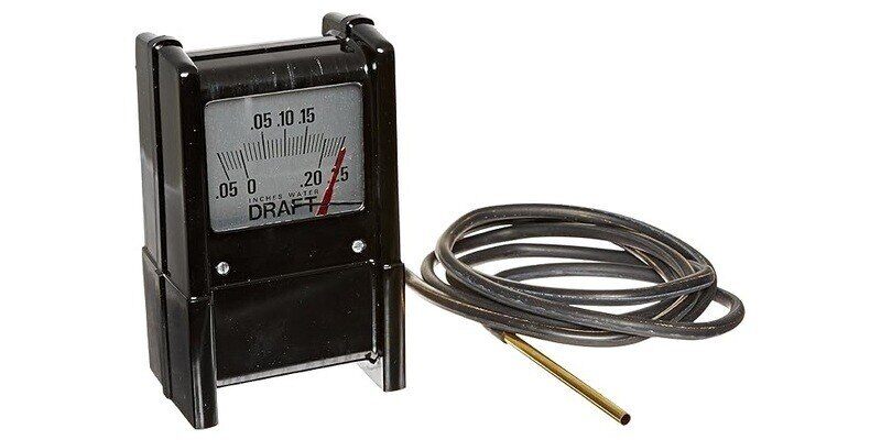 A draft meter whose needle is reading 0.25 water column inches (WCI). The meter is displayed against a white background.