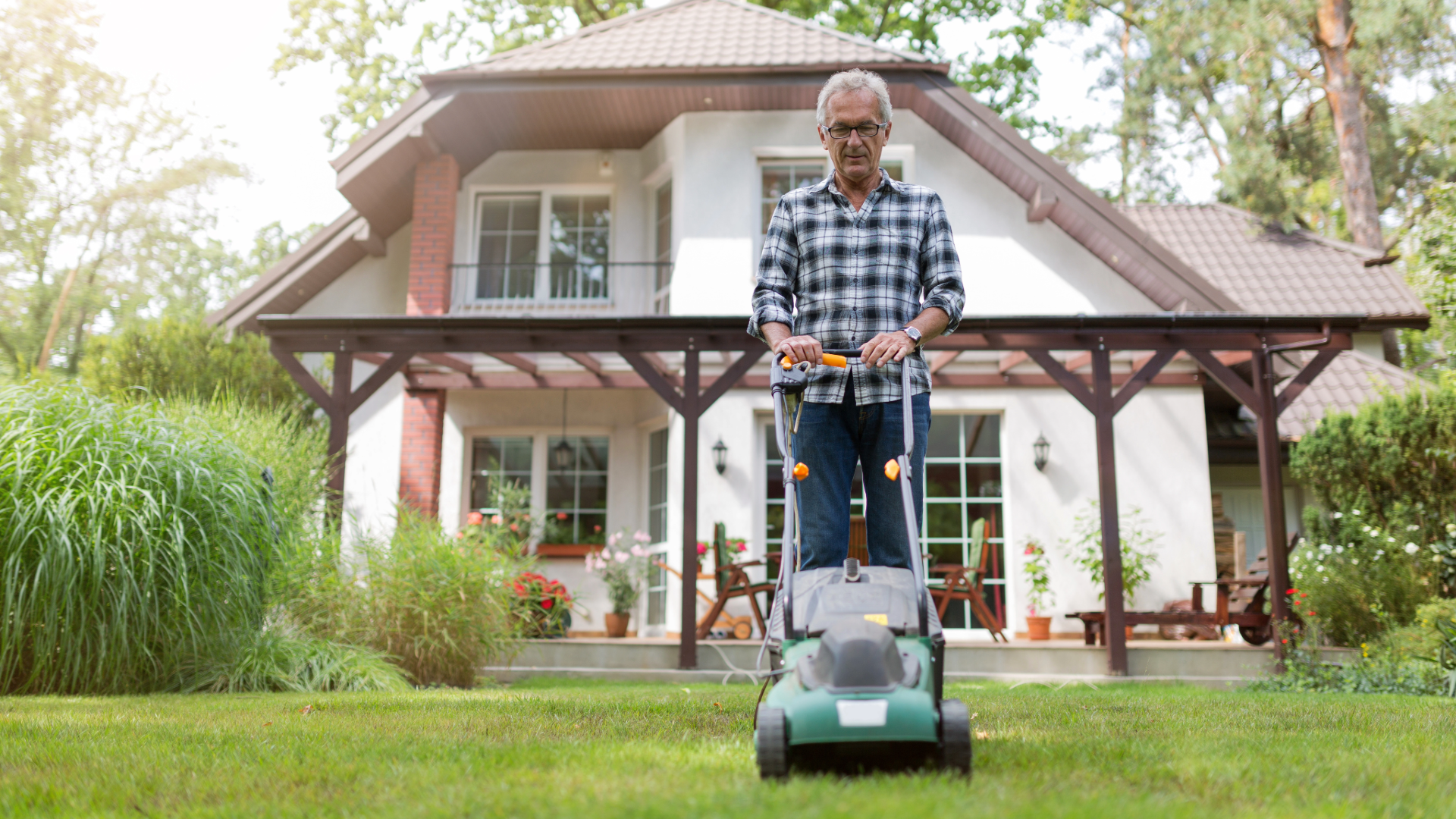 Bold-man-mowing-lawn