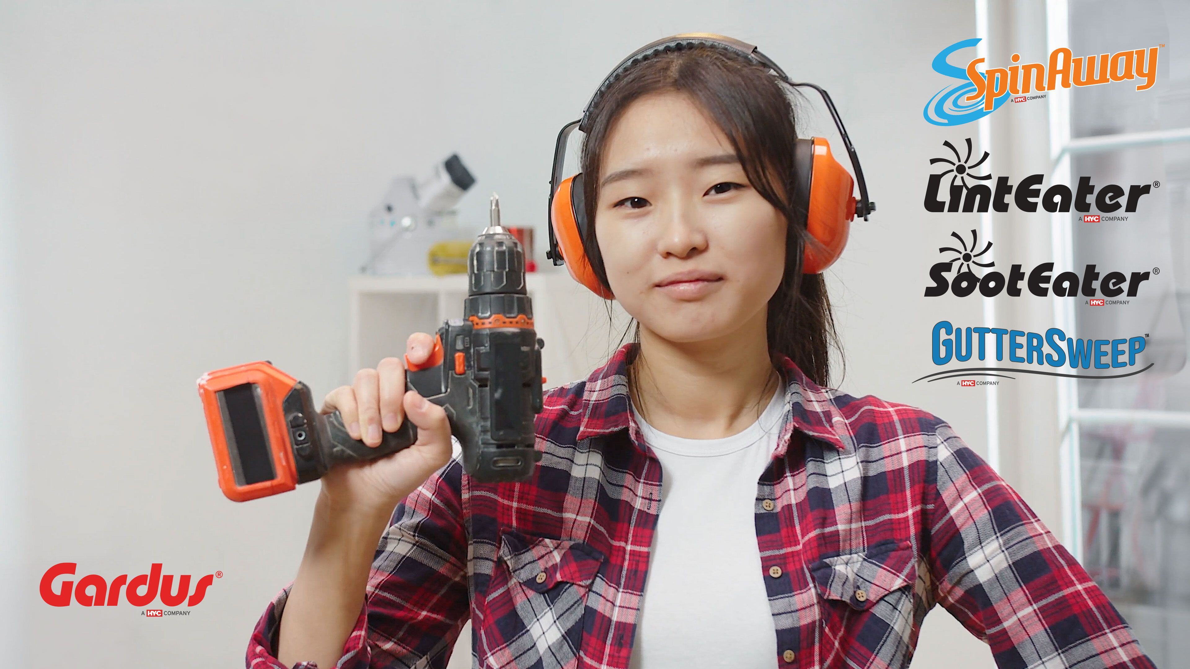 Image of woman holding drill with Gardus brand logos
