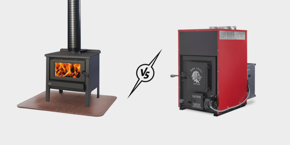On the left is a black wood stove sitting atop a stove board. On the right is a Fire Chief FC1000E wood burning furnace. Both are separated by a 